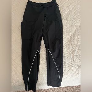 Black straight leg jaanuu scrub pants